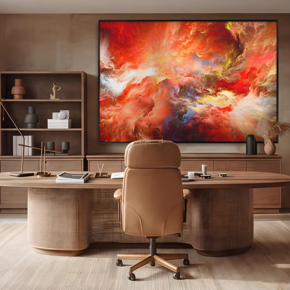 Tablou canvas cu pictura abstracta cu nori rosii, in rama de aluminiu negru, pe perete intr-un birou